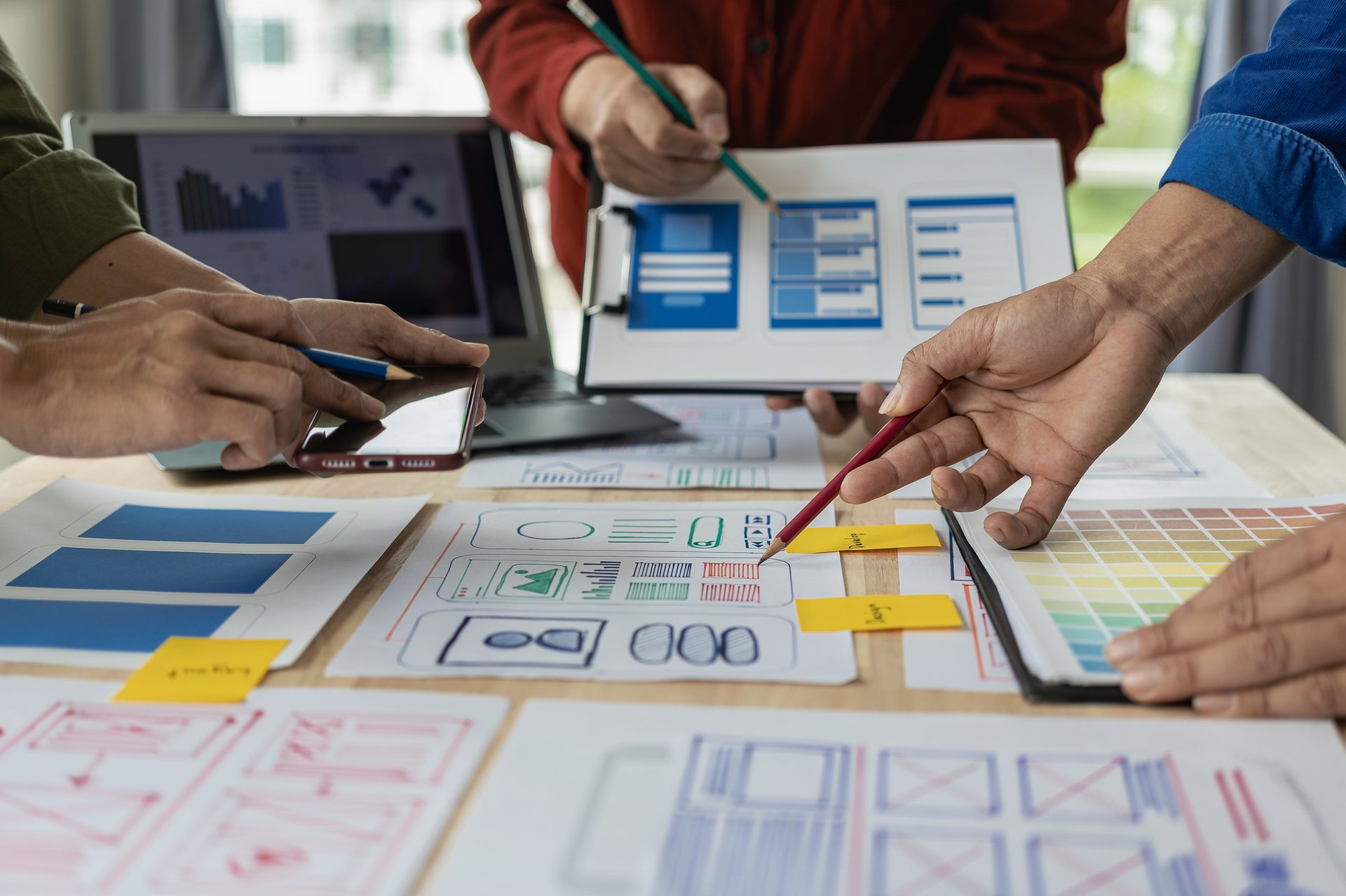 Web design team collaborating